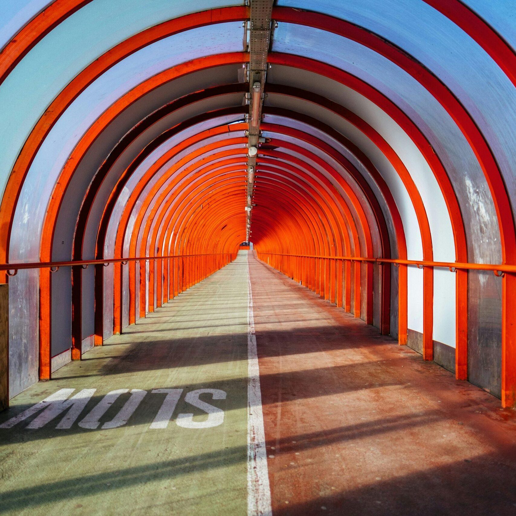 A sunlit tunnel symbolizing the intersection of reflection and action — the heart of creative coaching and direction. A sunlit tunnel symbolizing the intersection of reflection and action — the heart of creative coaching and direction.